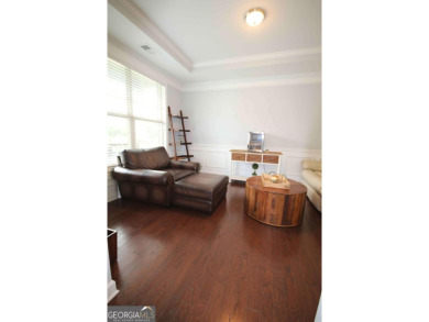Enter this tranquil retreat that exudes a quiet elegance.  Step on Berkeley Hills Country Club in Georgia - for sale on GolfHomes.com, golf home, golf lot