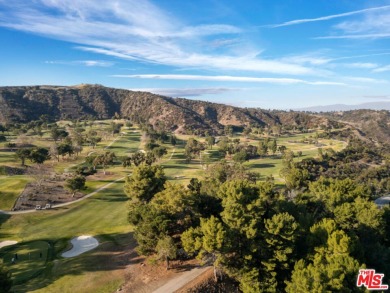 Nestled in one of Los Angeles' most coveted communities, this on Mountain Gate Country Club in California - for sale on GolfHomes.com, golf home, golf lot