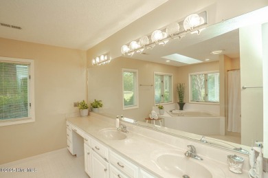 Spacious Coastal Retreat with Sunroom & Outdoor Entertaining on Brick Landing Plantation Yacht and Golf Club in North Carolina - for sale on GolfHomes.com, golf home, golf lot