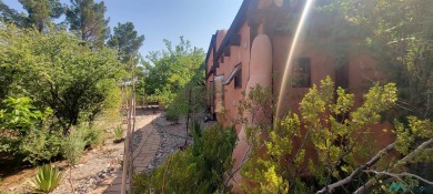 This Santa Fe style home is absolutely charming and rich in on Sierra Del Rio Golf Club in New Mexico - for sale on GolfHomes.com, golf home, golf lot