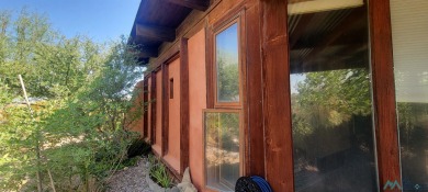 This Santa Fe style home is absolutely charming and rich in on Sierra Del Rio Golf Club in New Mexico - for sale on GolfHomes.com, golf home, golf lot