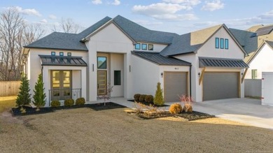 Welcome to this move-in-ready, SINGLE STORY new construction on Cedar Ridge Country Club in Oklahoma - for sale on GolfHomes.com, golf home, golf lot