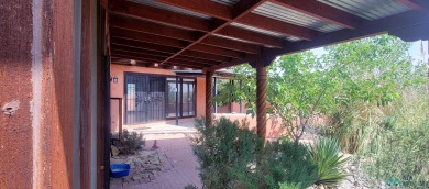 This Santa Fe style home is absolutely charming and rich in on Sierra Del Rio Golf Club in New Mexico - for sale on GolfHomes.com, golf home, golf lot