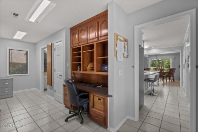 Spacious Coastal Retreat with Sunroom & Outdoor Entertaining on Brick Landing Plantation Yacht and Golf Club in North Carolina - for sale on GolfHomes.com, golf home, golf lot