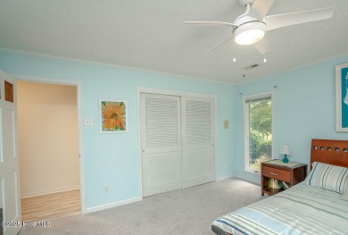 Spacious Coastal Retreat with Sunroom & Outdoor Entertaining on Brick Landing Plantation Yacht and Golf Club in North Carolina - for sale on GolfHomes.com, golf home, golf lot