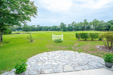 Spacious Coastal Retreat with Sunroom & Outdoor Entertaining on Brick Landing Plantation Yacht and Golf Club in North Carolina - for sale on GolfHomes.com, golf home, golf lot