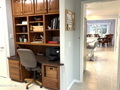 Spacious Coastal Retreat with Sunroom & Outdoor Entertaining on Brick Landing Plantation Yacht and Golf Club in North Carolina - for sale on GolfHomes.com, golf home, golf lot