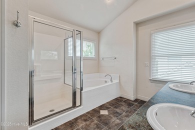 Nestled on a peaceful cul-de-sac in the prestigious Currituck on The Currituck Golf Club in North Carolina - for sale on GolfHomes.com, golf home, golf lot