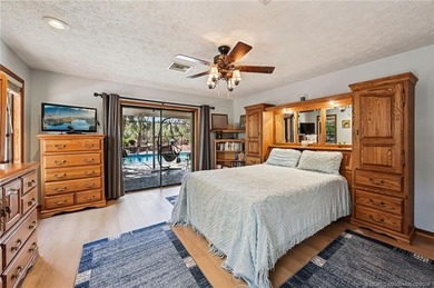 RARE ACRE RETREAT IN MARTIN DOWNS! Experience the perfect blend on Martin Downs Country Club in Florida - for sale on GolfHomes.com, golf home, golf lot