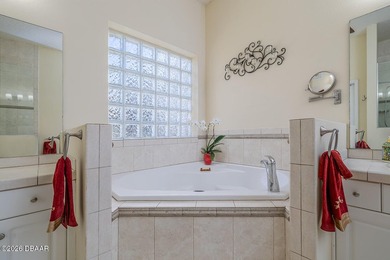 Halifax Plantation pool home; Move in now! The view is worth a on Halifax Plantation Golf Club in Florida - for sale on GolfHomes.com, golf home, golf lot