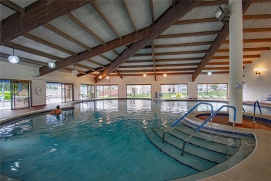 Wake up to tranquil water views in this stunning 2-bedroom on Sunrise Lakes Phase III in Florida - for sale on GolfHomes.com, golf home, golf lot