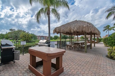 Wake up to tranquil water views in this stunning 2-bedroom on Sunrise Lakes Phase III in Florida - for sale on GolfHomes.com, golf home, golf lot