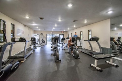 Wake up to tranquil water views in this stunning 2-bedroom on Sunrise Lakes Phase III in Florida - for sale on GolfHomes.com, golf home, golf lot