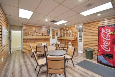 Wake up to tranquil water views in this stunning 2-bedroom on Sunrise Lakes Phase III in Florida - for sale on GolfHomes.com, golf home, golf lot