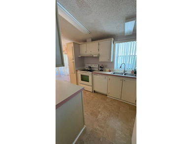 Welcome to your perfect sunny Florida getaway! This beautifully on Sabal Springs Golf and Racquet Club in Florida - for sale on GolfHomes.com, golf home, golf lot