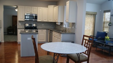 Prepare to fall in love! This well-kept ranch townhome located on Carillon Lakes 3 Hole Course in Illinois - for sale on GolfHomes.com, golf home, golf lot