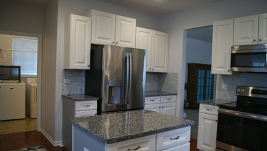 Prepare to fall in love! This well-kept ranch townhome located on Carillon Lakes 3 Hole Course in Illinois - for sale on GolfHomes.com, golf home, golf lot