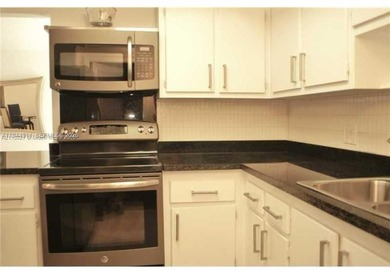 BEAUTIFUL 2/2 WITH WATER AND GOLF VIEWS, CONDO LUXURY TOTALLY on Davie Golf Club in Florida - for sale on GolfHomes.com, golf home, golf lot