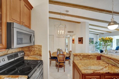 Prime location in Palm Beach Gardens! This fully furnished on PGA National Golf Club in Florida - for sale on GolfHomes.com, golf home, golf lot