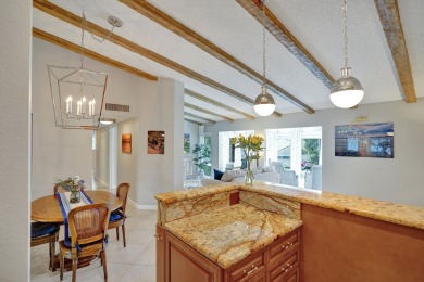 Prime location in Palm Beach Gardens! This fully furnished on PGA National Golf Club in Florida - for sale on GolfHomes.com, golf home, golf lot