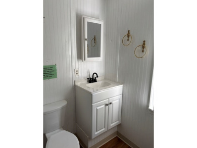 Investment opportunity or a single family home with additional on Captains Cove Golf and Yacht Club in Virginia - for sale on GolfHomes.com, golf home, golf lot