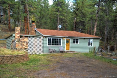 Charming bungalow in a fantastic Upper Bear Creek location! Only on Evergreen Golf Course in Colorado - for sale on GolfHomes.com, golf home, golf lot