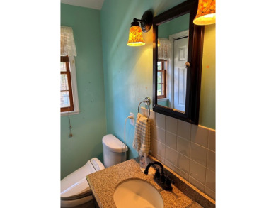 Investment opportunity or a single family home with additional on Captains Cove Golf and Yacht Club in Virginia - for sale on GolfHomes.com, golf home, golf lot