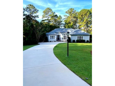 Welcome to 216 Sumter Lane, a beautifully updated waterfront on Monticello Golf Club At Savannah Lakes in South Carolina - for sale on GolfHomes.com, golf home, golf lot