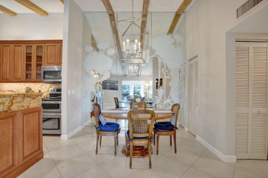 Prime location in Palm Beach Gardens! This fully furnished on PGA National Golf Club in Florida - for sale on GolfHomes.com, golf home, golf lot