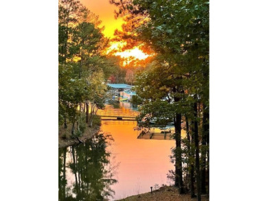 Welcome to 216 Sumter Lane, a beautifully updated waterfront on Monticello Golf Club At Savannah Lakes in South Carolina - for sale on GolfHomes.com, golf home, golf lot