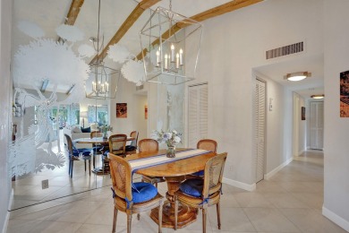 Prime location in Palm Beach Gardens! This fully furnished on PGA National Golf Club in Florida - for sale on GolfHomes.com, golf home, golf lot