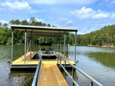Welcome to 216 Sumter Lane, a beautifully updated waterfront on Monticello Golf Club At Savannah Lakes in South Carolina - for sale on GolfHomes.com, golf home, golf lot