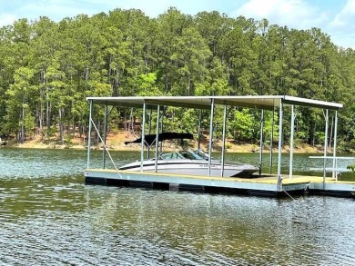 Welcome to 216 Sumter Lane, a beautifully updated waterfront on Monticello Golf Club At Savannah Lakes in South Carolina - for sale on GolfHomes.com, golf home, golf lot