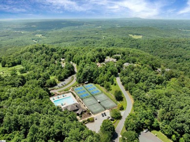 Welcome to low-maintenance mountain living at its finest in The on The Cliffs at Glassy Golf and Country Club in South Carolina - for sale on GolfHomes.com, golf home, golf lot