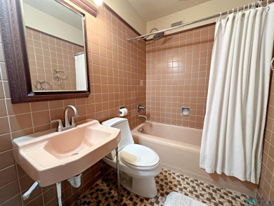 This stunning custom home, rich in history, was built by the on Spring River Golf Course in New Mexico - for sale on GolfHomes.com, golf home, golf lot