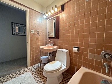 This stunning custom home, rich in history, was built by the on Spring River Golf Course in New Mexico - for sale on GolfHomes.com, golf home, golf lot