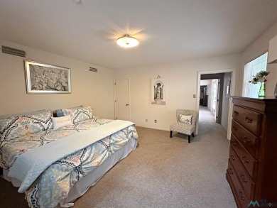 This stunning custom home, rich in history, was built by the on Spring River Golf Course in New Mexico - for sale on GolfHomes.com, golf home, golf lot