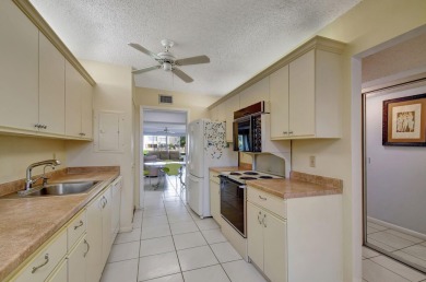 Welcome to this spacious first-floor condo, perfectly situated on Poinciana Golf Club in Florida - for sale on GolfHomes.com, golf home, golf lot