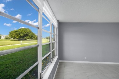 Stunning condo with expansive views of the golf course on Palm-Aire Country Club and Resort - Palms in Florida - for sale on GolfHomes.com, golf home, golf lot