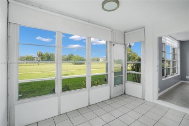 Stunning condo with expansive views of the golf course on Palm-Aire Country Club and Resort - Palms in Florida - for sale on GolfHomes.com, golf home, golf lot