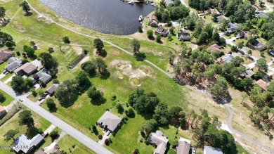 Buy a beautiful water view lot and build your dream home in one on Harbour Point Golf Club in North Carolina - for sale on GolfHomes.com, golf home, golf lot
