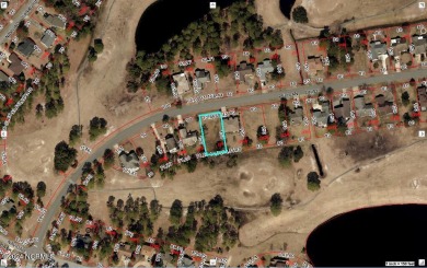 Buy a beautiful water view lot and build your dream home in one on Harbour Point Golf Club in North Carolina - for sale on GolfHomes.com, golf home, golf lot