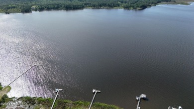 Buy a beautiful water view lot and build your dream home in one on Harbour Point Golf Club in North Carolina - for sale on GolfHomes.com, golf home, golf lot
