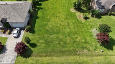 Buy a beautiful water view lot and build your dream home in one on Harbour Point Golf Club in North Carolina - for sale on GolfHomes.com, golf home, golf lot