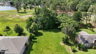 Buy a beautiful water view lot and build your dream home in one on Harbour Point Golf Club in North Carolina - for sale on GolfHomes.com, golf home, golf lot