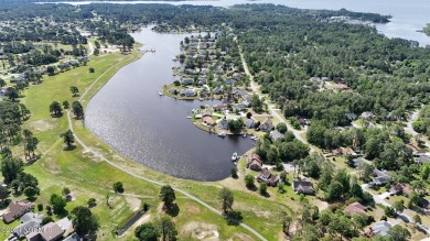 Buy a beautiful water view lot and build your dream home in one on Harbour Point Golf Club in North Carolina - for sale on GolfHomes.com, golf home, golf lot