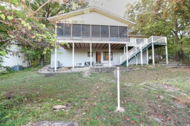 This charming partial lakeview home offers an inviting retreat on Mountain Ranch Golf Club in Arkansas - for sale on GolfHomes.com, golf home, golf lot