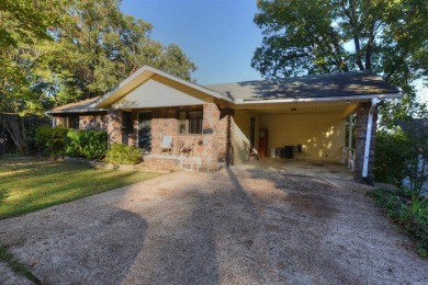 This charming partial lakeview home offers an inviting retreat on Mountain Ranch Golf Club in Arkansas - for sale on GolfHomes.com, golf home, golf lot