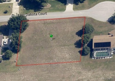 This cleared, half-acre homesite sits directly on the 12th on Citrus Hills Golf Club in Florida - for sale on GolfHomes.com, golf home, golf lot
