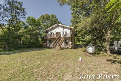 Discover country living in this 3-bedroom, 1.5-bath contemporary on Thoroughbred Golf Club in Michigan - for sale on GolfHomes.com, golf home, golf lot